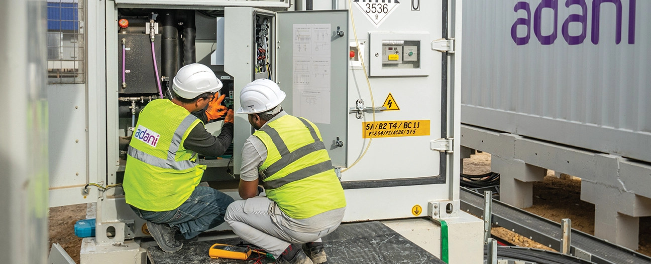 AGEL technicians servicing inverter / container equipment