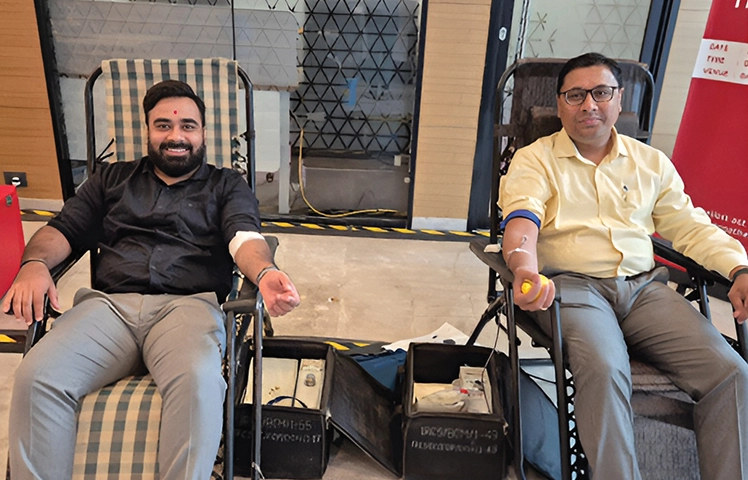 Employees at AGEL blood donation camp